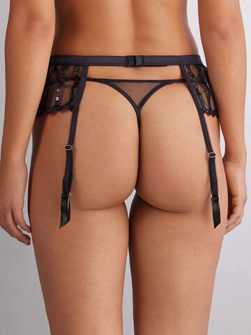 INTIMISSIMI Strumpfhalter 'SEE THE MAGIC' in Schwarz