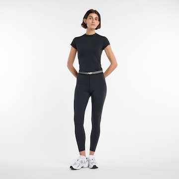 Skinny Pantalon de sport new balance en noir