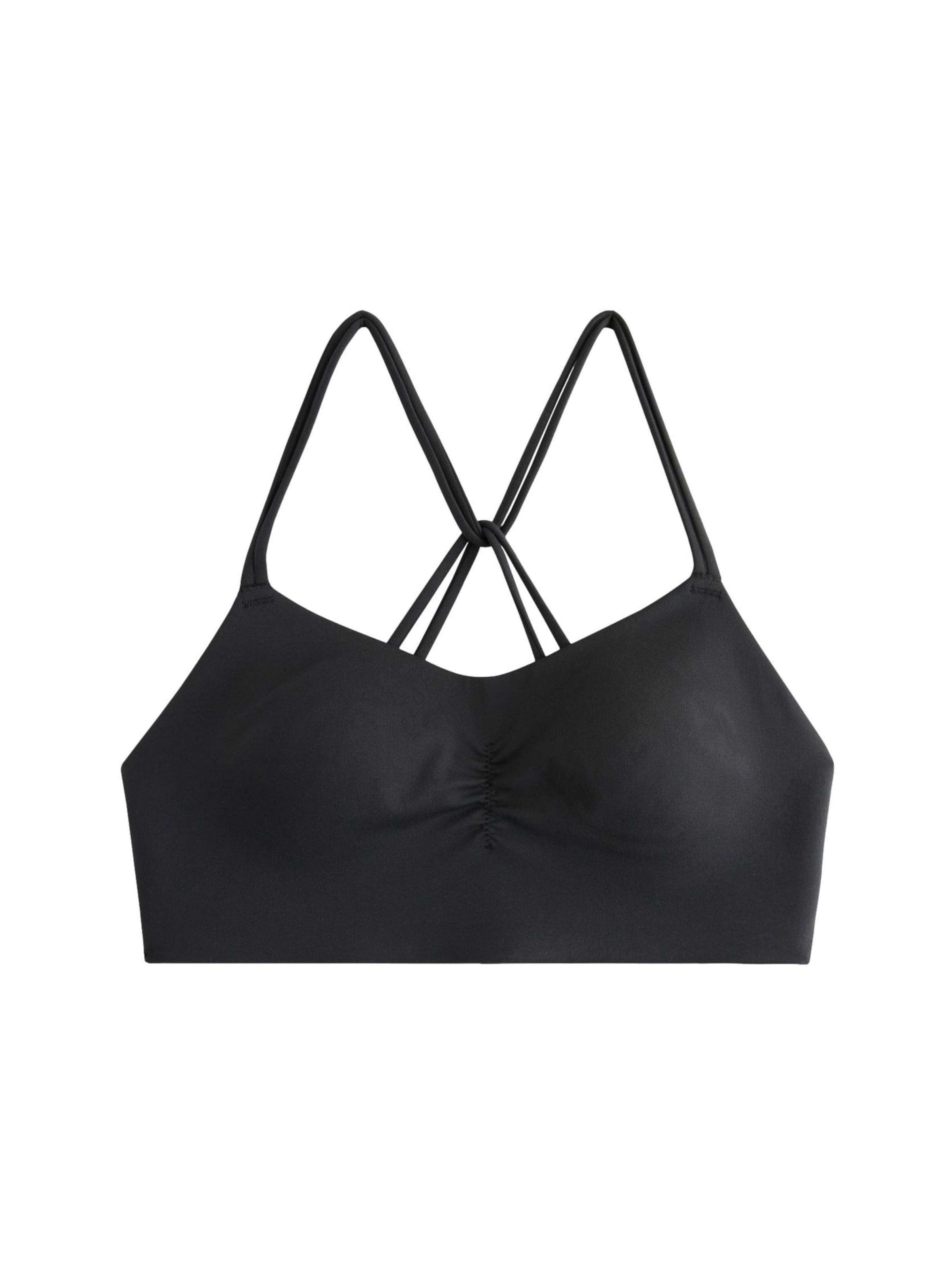Next Μπουστάκι Αθλητικό σουτιέν σε μαύρο: μπροστά