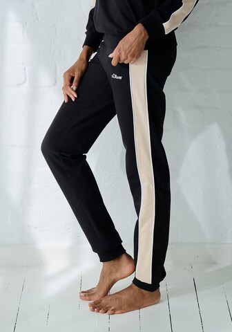 Tapered Pantaloni di s.Oliver in nero