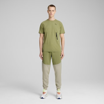 Effilé Pantalon de sport PUMA en vert