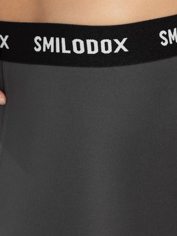Skinny Pantalon de sport ' Zeyn ' Smilodox en gris