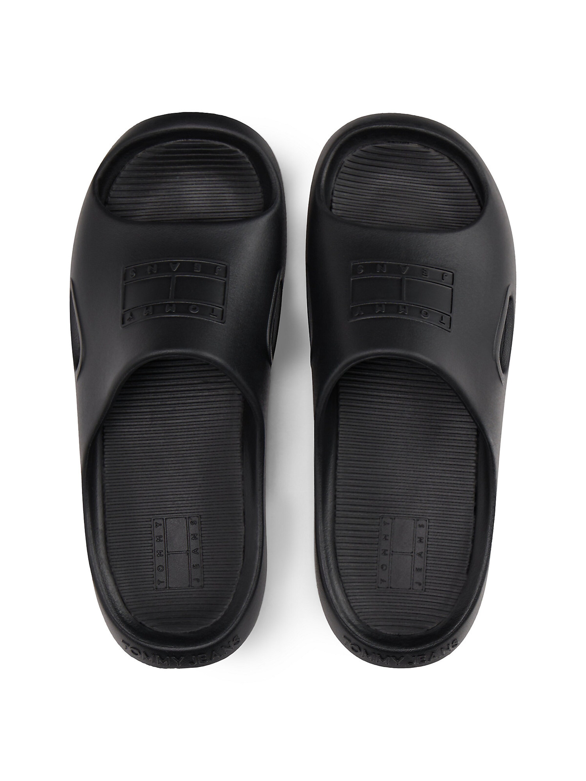 Claquettes / Tongs Tommy Jeans en noir