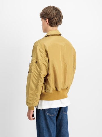 Giacca invernale 'CWU-45 Heritage' di ALPHA INDUSTRIES in oro