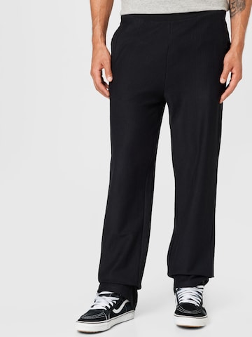 Regular Pantalon Urban Classics en noir : devant