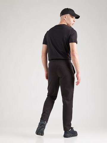 PUMA Regular Sports trousers 'ESS No. 1' in Black
