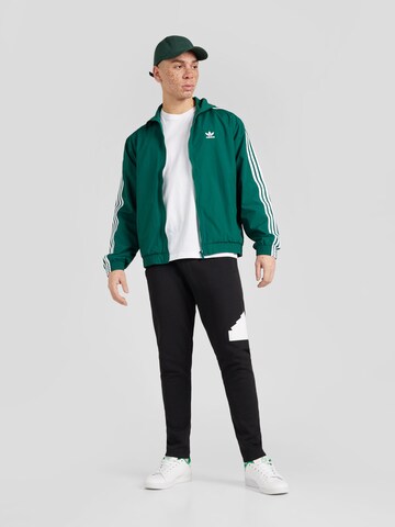 ADIDAS SPORTSWEAR Tapered Sportsbukser i sort