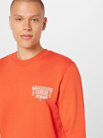Bluză de molton de la Tommy Jeans pe portocaliu