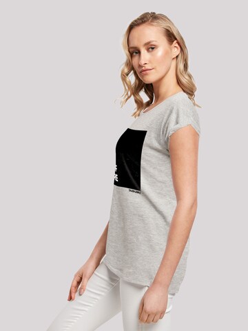 T-shirt 'Self Care' F4NT4STIC en gris