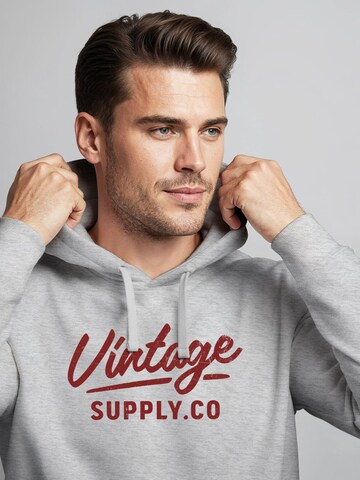 Neverless Sweatshirt 'Vintage Supply Co.'‌‌‌ in Grau