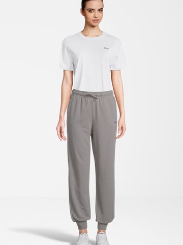 FILA Tapered Urheiluhousut värissä lila