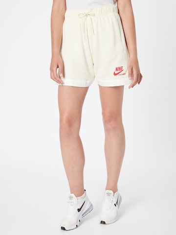 Nike Sportswear Lużny krój Spodnie w kolorze beżowy: przód