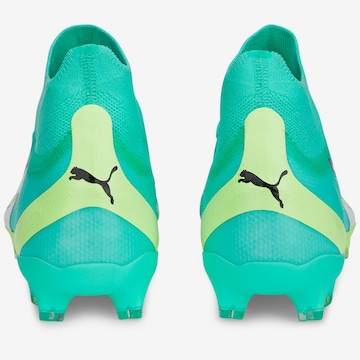 PUMA - Chuteira em verde