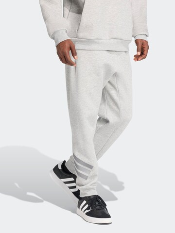 ADIDAS SPORTSWEAR Tapered Παντελόνι φόρμας 'FI' σε γκρι: μπροστά