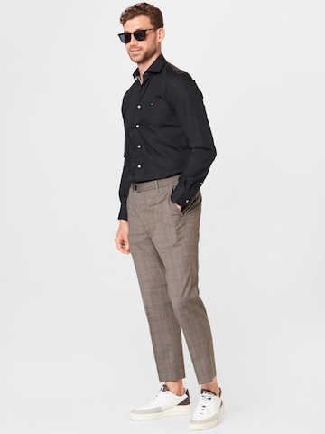 regular Pantaloni con piega frontale 'Konan' di AllSaints in marrone