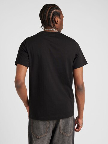 Tricou de la WEEKDAY pe negru