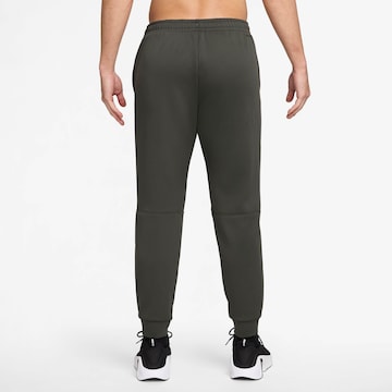 NIKE Regular Athletic Pants in Grey