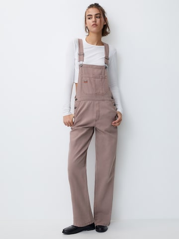 regular Pantaloni con pettorina di Pull&Bear in rosa: frontale