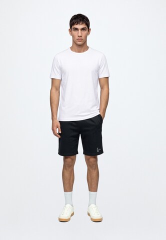 Karl Kani - regular Pantalón 'Signature' en negro