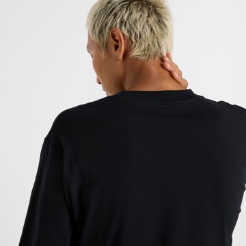 T-Shirt fonctionnel 'Athletics' new balance en noir