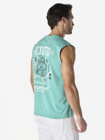 KOROSHI Paita värissä vihreä