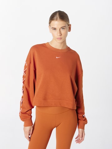 NIKE Sport sweatshirt i orange: framsida