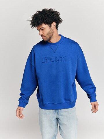 LYCATI exclusive for ABOUT YOU Sweatshirt 'Inning' in Blau