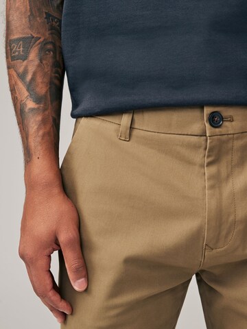 Next Slimfit Chino hlače | rjava barva