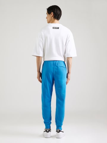 Nike Sportswear Tapered Trousers 'Club Fleece' in Blue