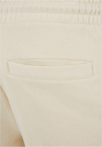 regular Pantaloni di Karl Kani in beige