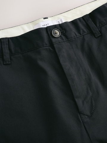 Next - Slimfit Pantalón chino en negro