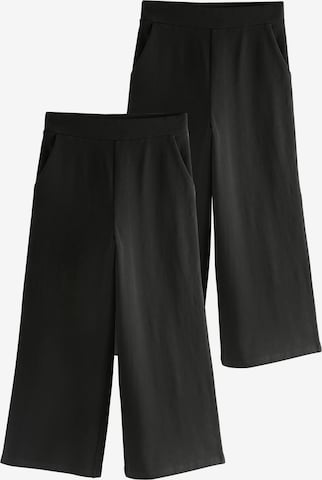 juoda Next Plačios klešnės Kelnės: priekis