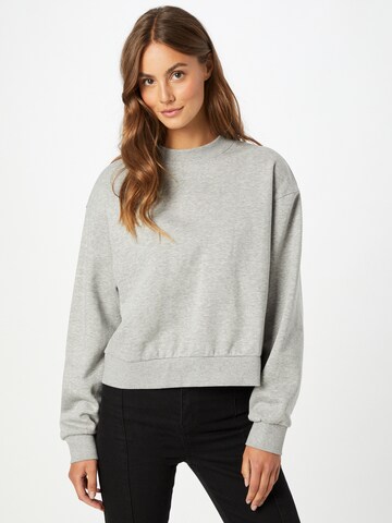 Sweat-shirt 'Amaze' WEEKDAY en gris : devant