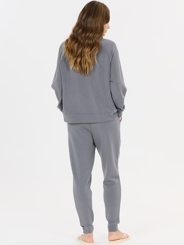 Athlecia - Tapered Pantalón deportivo 'Jacey' en gris