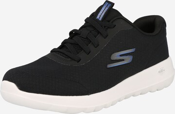 Baskets basses SKECHERS en noir : devant