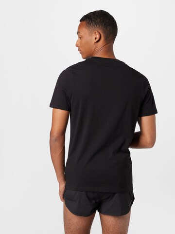 PUMA T-Shirt in Schwarz