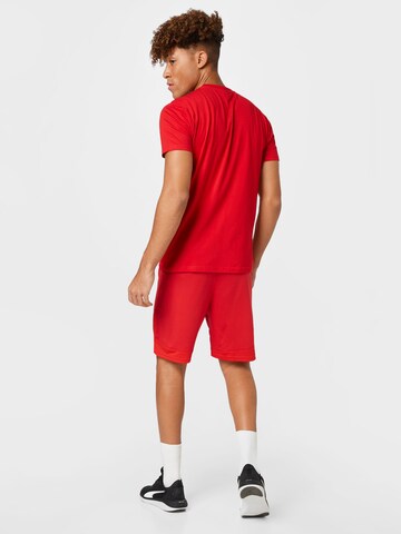 Hummel Regular Workout Pants 'Lead Poly' in Red