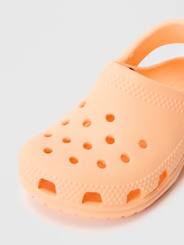 Calzatura aperta 'Classic' di Crocs in arancione