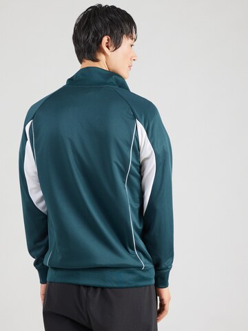 Felpa sportiva di PUMA in verde