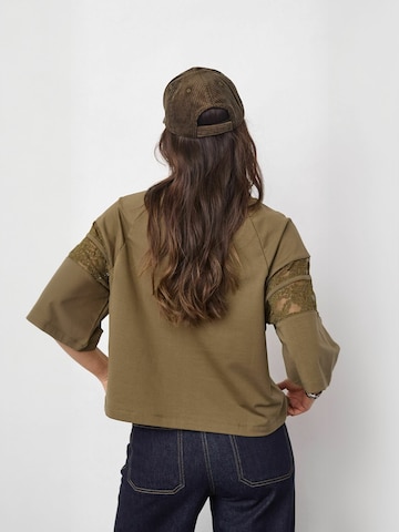 Haut ' Ely ' co'couture en vert
