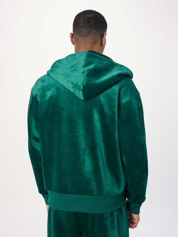 Veste de survêtement 'Premium Essentials+' ADIDAS ORIGINALS en vert