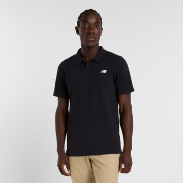 new balance Poloshirt in Schwarz: Vorderseite