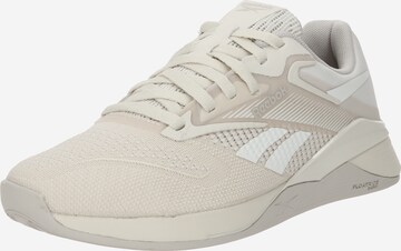 Chaussure de sport 'NANO X4' Reebok en beige : devant