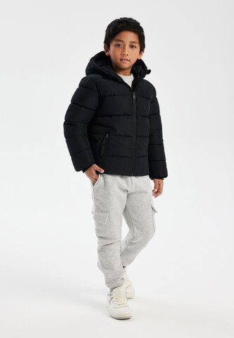 MINOTI Winterjacke in Schwarz: Vorderseite