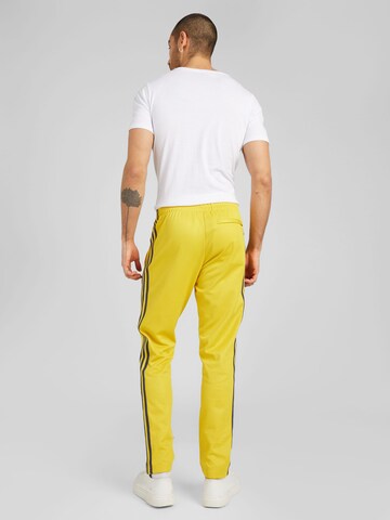 ADIDAS PERFORMANCE Regular Workout Pants in Yellow