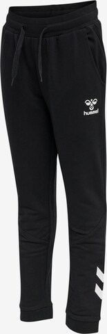 Effilé Pantalon de sport Hummel en noir