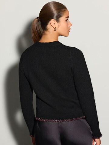 Next Sweater in Black
