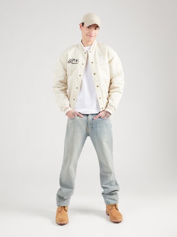 Veste mi-saison 'Diner' Karl Kani en beige