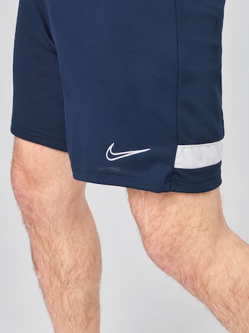 NIKE Regularen Športne hlače 'Academy' | modra barva