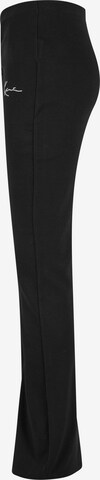 évasé Pantalon Karl Kani en noir